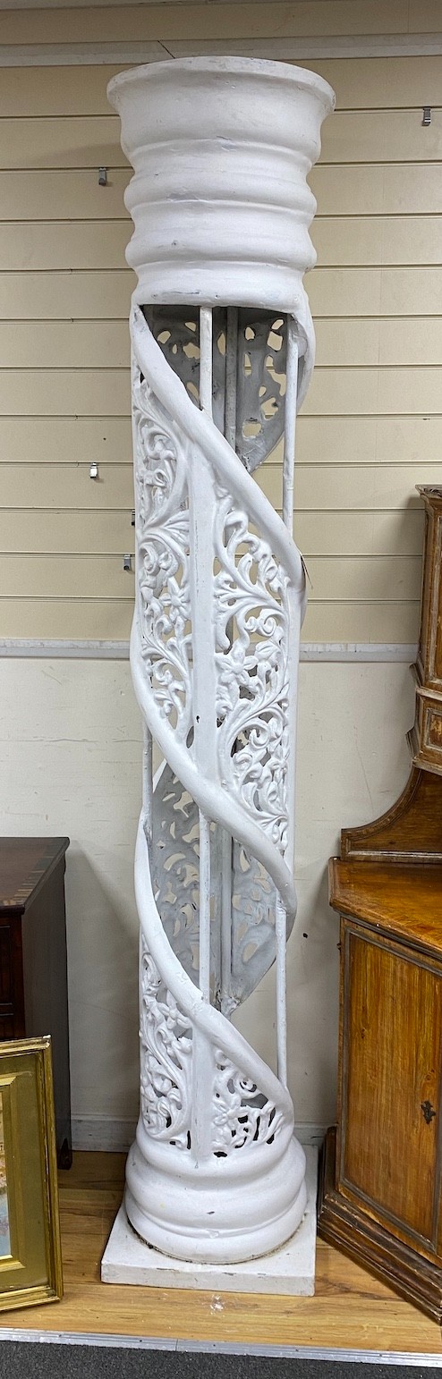 A pair of large white painted fibre glass helical columns, height 239cm